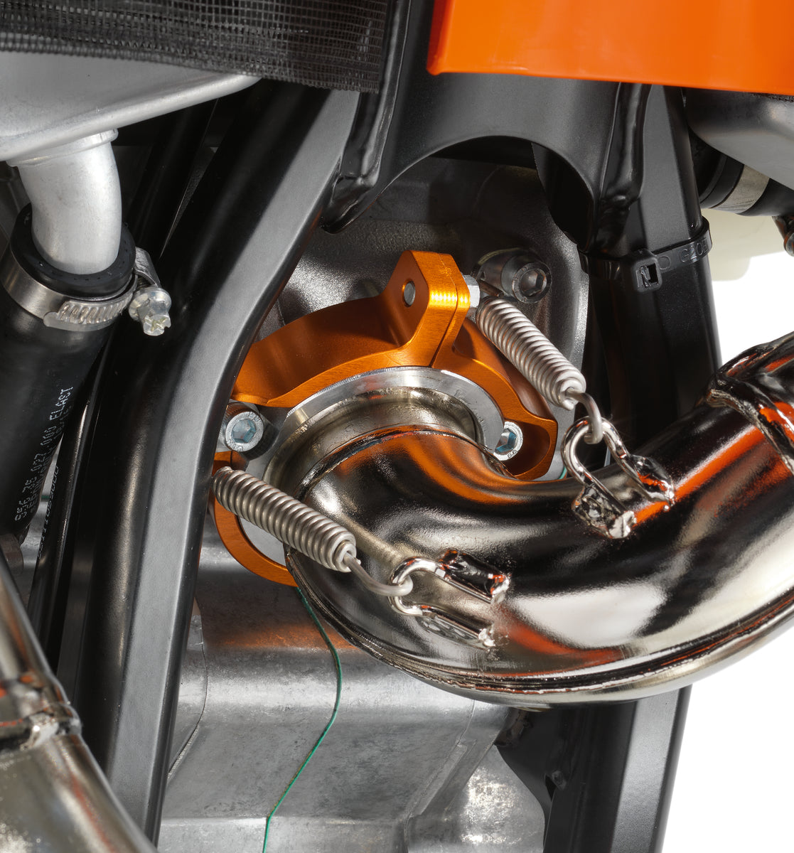 Exhaust flange guard — KTM MX/Enduro 2017-2023